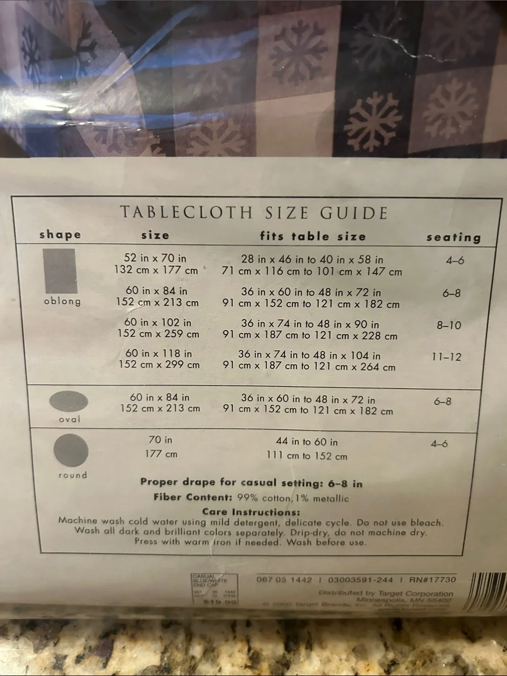 Oblong 60” by 128” Blue and White Snowflake Tablecloth